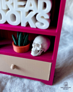 Miniature dødningehoved til bogreol